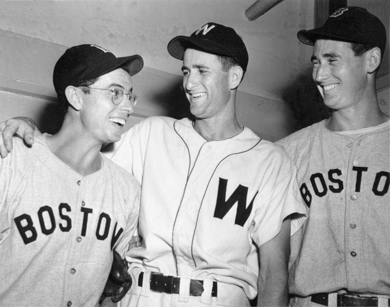 ** FILE ** In this July 7, 1946 file photo, Washington Senators Mickey Vernon, center, is flanked by Dom DiMaggio, left, and Ted Williams, after a Washington Senators and Boston Red Sox doubleheader in Washington, D.C. Vernon, a two-time American League batting champion with the Washington Senators and seven-time All-Star first baseman during a 20-year career in the major leagues, died Wednesday in Media, Pa. He was 90. (AP Photo/File)
