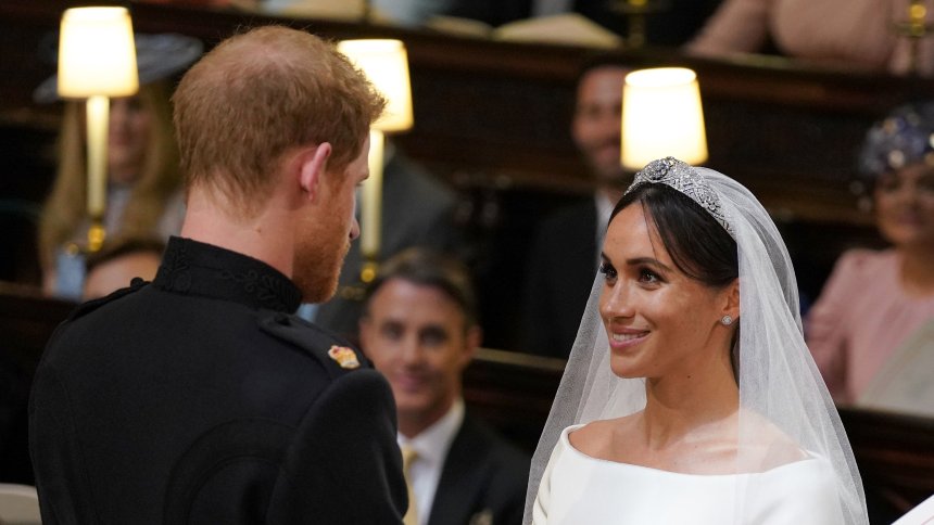 Prince Harry and Meghan Markle during their wedding at St George's Chapel, Windsor Castle. Foto: Dominic Lipinski/PA Wire/dpa