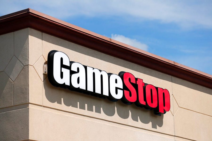 FILE - In this May 7, 2020 file photo, a GameStop store is seen in St. Louis. Two hedge funds are bowing out of their short positions on the money-losing video game retailer. Citron Research’s Andrew Left said in a video posted on YouTube that his company is going to become more judicious in shorting stocks. Melvin Capital is also exiting GameStop, with manager Gabe Plotkin telling CNBC that the hedge fund was taking a significant loss. (AP Photo/Jeff Roberson, File)