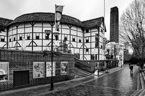 A black and white photo of The Globe Theatre in England. This is the original theatre where Shakespeare put up his plays. 