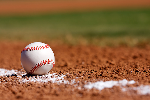 Baseball on the Chalk Line of the Infield